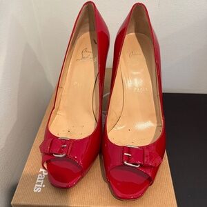 Red Christian Louboutin shoes